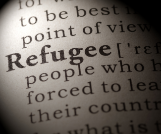 A page of a dictionary focused on the word "refugee." 