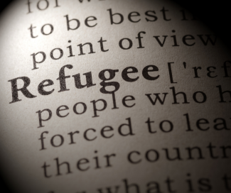 A page of a dictionary focused on the word "refugee."